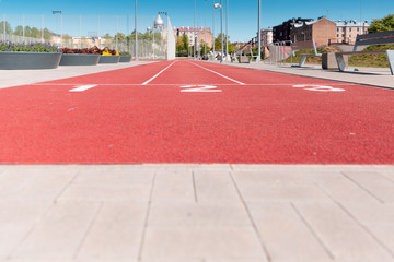 Running track texture with lane numbers at city stadium