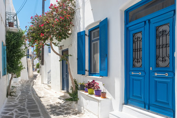 View of a typical narrow street in old town of Naoussa, Paros island, Cyclades