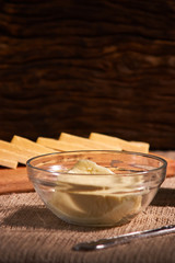 Butter and chees and milk for breakfast, over rustic wooden background with copy space. Morning breakfast