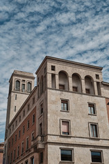 Fototapeta na wymiar old buildings in the center of Piacenza - Fascist architecture - emilia romagna - italy.