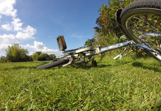 Bicycle on the grass on a sunny summer day outdoor