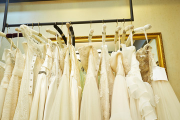 White wedding dresses on rack 