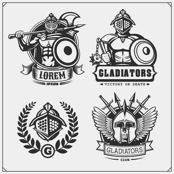 Set of ancient warrior emblems, labels and design elements. Gladiator and spartan weapon and armour. Print design for t-shirt.
