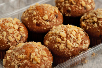 Cupcakes in the package. Close-up. Baking muffins for breakfast. Muffins for dessert. Six pieces of cupcakes.