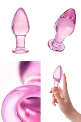 Clear colored Butt plug made of glass on a white isolated background