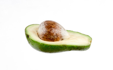 Half of avocado on white background