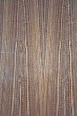 Wood texture. The background is brown with pinkish stripes.