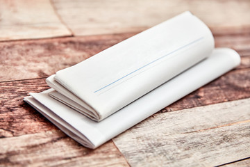 Zeitung und Info Newsletter gefaltet