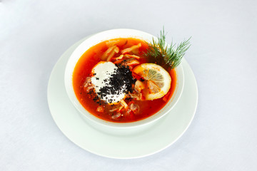 Pickle soup. Classic Russian soup, with cucumber and sour cream. With lemon.