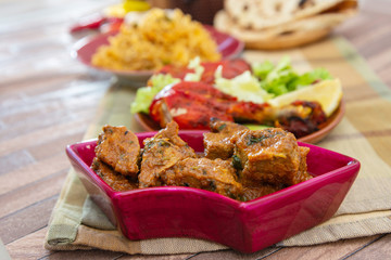 Traditional Indian food chicken tandoori and Tikka with garlic naan