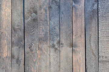 Smooth vertical boards. Old wooden fence with faded wood. Blank background for layouts.
