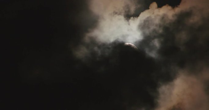 moon and clouds at night, clouds pass by. Wind, 