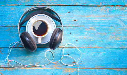 headphones and a cup of coffee, relaxing and listening to music or an audio book, flat lay, good...