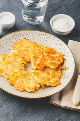 Pan-fried potato pancakes - rosti, kartoffelpuffer, latkes, draniki, hash browns
