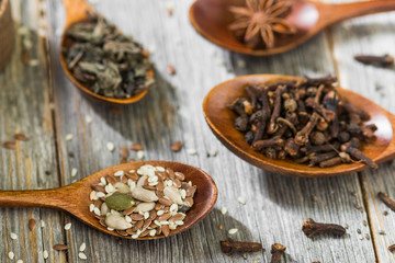 Spices on a gray wooden table. Rustic style