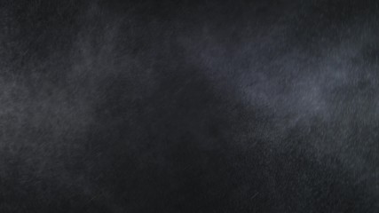 Aerosol Sprays Small Drops of Water on a Black Background. Slow Motion in 120 fps. Spray the liquid in the air. Micro drops of water fly in the air.