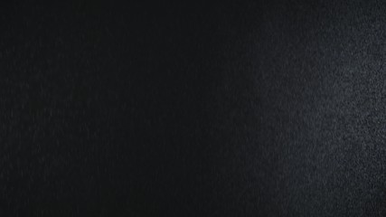 Rain on black background