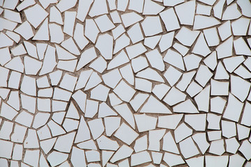 Texture, background. Wall of white tile fragments