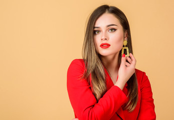 She is really cute. Sexy woman with professional makeup. Fashion portrait of elegant woman. jewelry earrings. Girl in red jacket. beauty and fashion. hair beauty and hairdresser salon. copy space