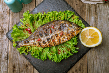 Dorado on grill on board