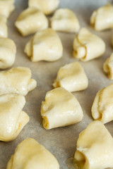 Cottage cheese cookies are on a baking sheet before cooking in the oven