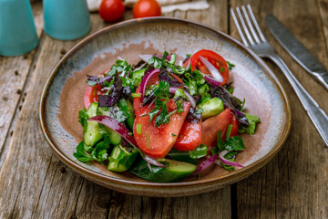Vegetable salad with tomatoes and cucumbers