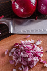 red onion cut on a wooden board