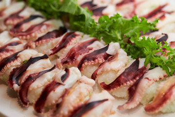 Boiled octopus sushi at buffet