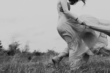 fashionable woman in the wind 