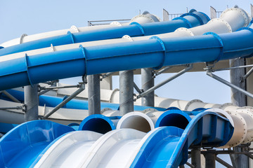 Round water slide from the pipes in aquapark.