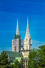 Obraz premium Zagreb, capital of Croatia, catholic cathedral hidden among trees