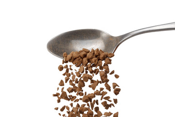 Instant granulated coffee in a spoon isolated on white background top grade