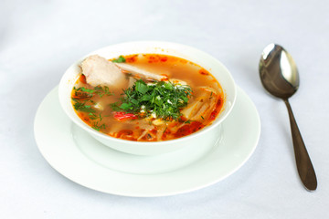 Soup from cabbage and meat with sour cream.
