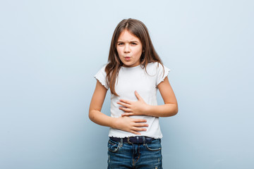 Cute girl sick, suffering from stomachache, painful disease concept.