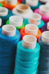 Colorful spools of sewing thread. Colored thread for sewing