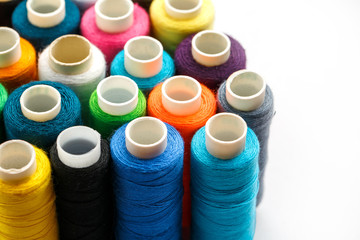 Colorful spools of sewing thread. Colored thread for sewing