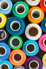 Colorful spools of sewing thread. Colored thread for sewing
