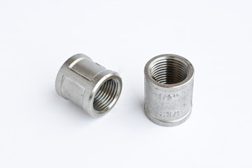 Stainless steel fittings, threaded fitting for water and gas pipes. Isolated object.