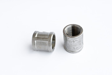 Stainless steel fittings, threaded fitting for water and gas pipes. Isolated object.