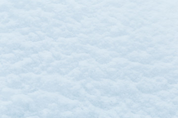 Fototapeta premium background of fresh snow texture in blue tone