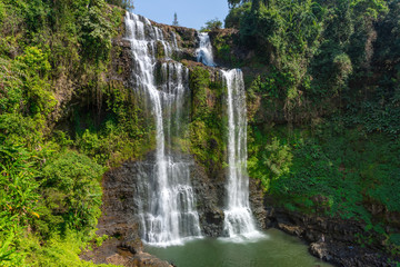 Fototapeta na wymiar Tad Fan waterfall in The deep forest in Southern of Laos 