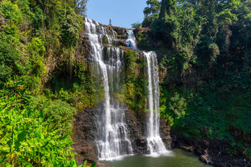 Tad Fan waterfall in The deep forest in Southern of Laos 