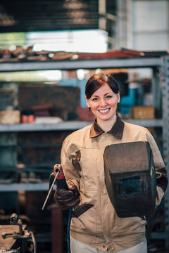 Portrait Of A Female Welder At The Factory.