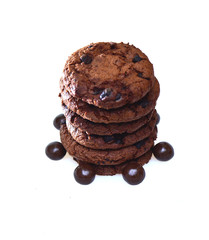 Chocolate biscuits plus raisins, round in shape with a rough texture