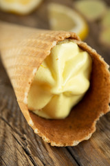 ginger lemon ice cream in a waffle cone. Soft focus. Macro 