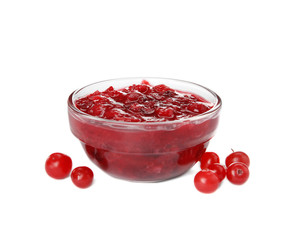 Bowl of cranberry sauce on white background
