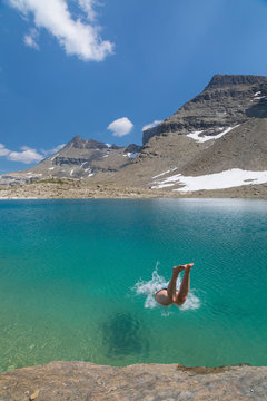 Female hiker swimming in Jewel lake