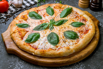 Italian pizza Margherita with basil