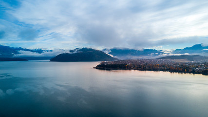 Sunrise over pristine lake with mountains on the background. Wanaka, Otago, South Island, New Zealand