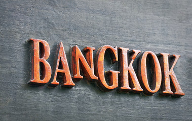Orange Bangkok Text with All Capital Letters on the Wall